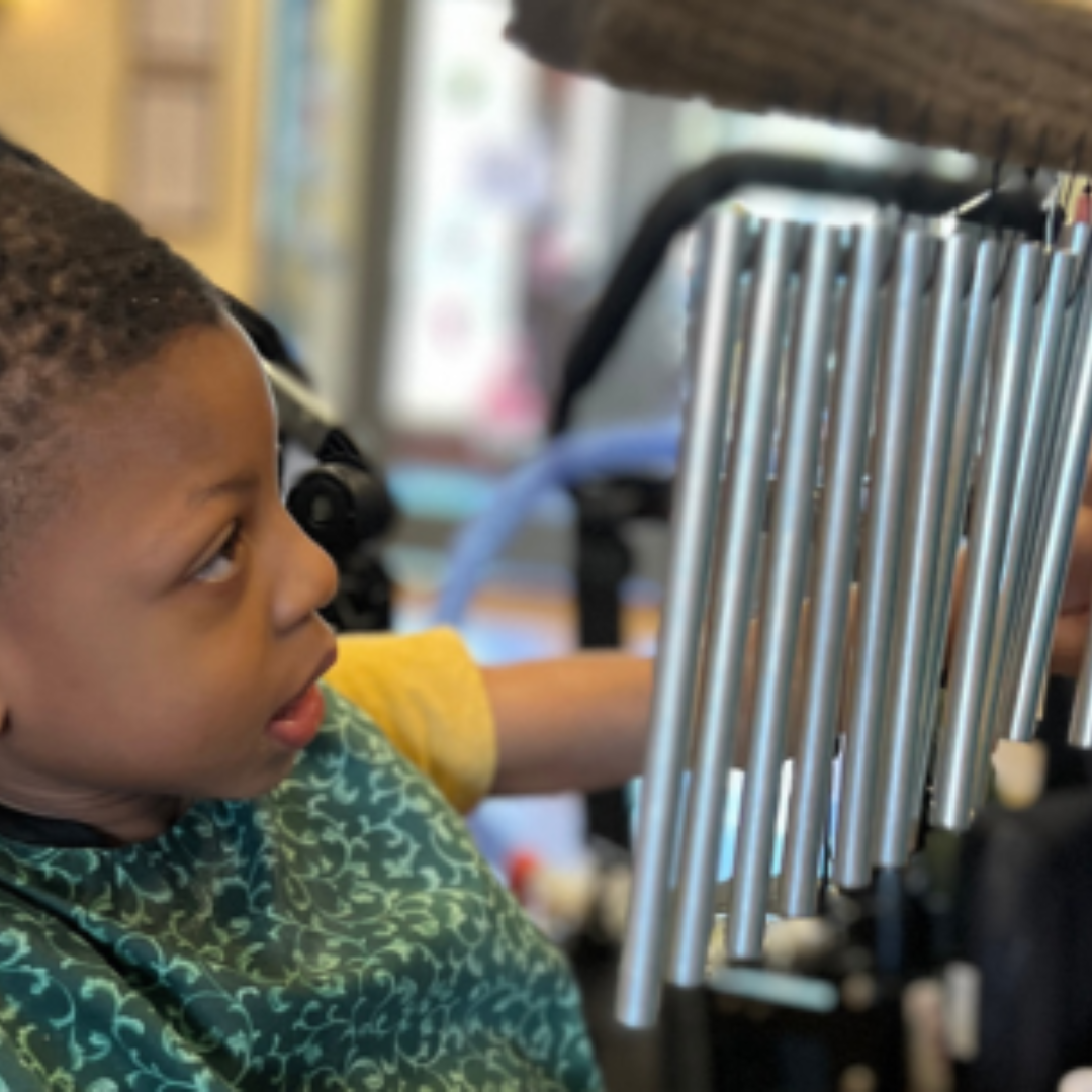 boy with musical instrument