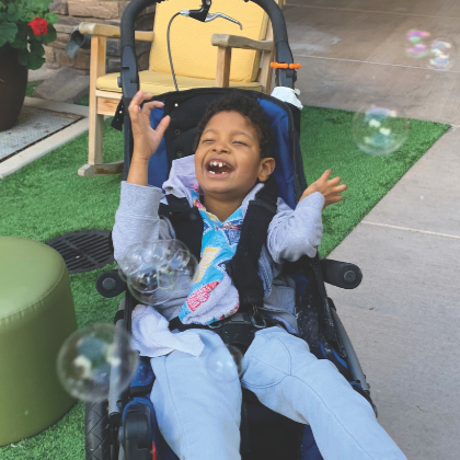 Boy with bubbles - square