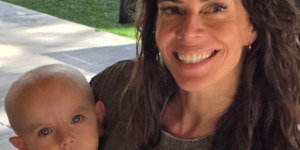 Volunteer with little boy
